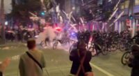 Rioters Attack Seattle Police with Rocks, Fireworks During Pro-Illegal Immigrant Protest.