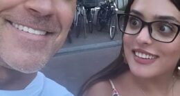 Robbie Williams baffled strangers by asking them for selfies as he strolled around Amsterdam over the weekend in a clip shared on Instagram on Sunday
