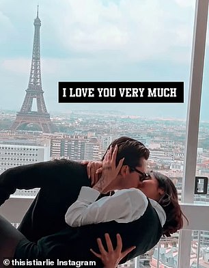 One clip showed the couple in a passionate embrace as they posed in front of the Eiffel Tower