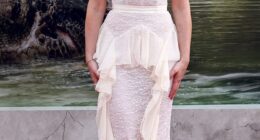Scarlett Johansson commanded attention in a snug-fitting white dress as she led her co-stars at the Jurassic World Rebirth premiere in New York City on Monday