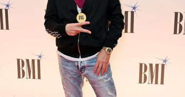 Nightcrawlers legend John Reid has died at the age of 61 - pictured in 2022