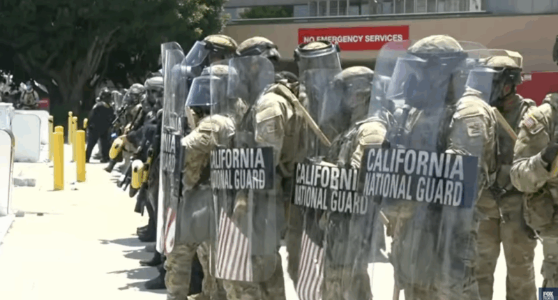 national guard troops in LA with shields