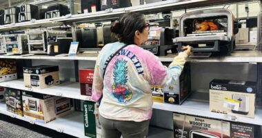 Shoppers cut spending at retailers in May. Trade wars still a drag on the economy.