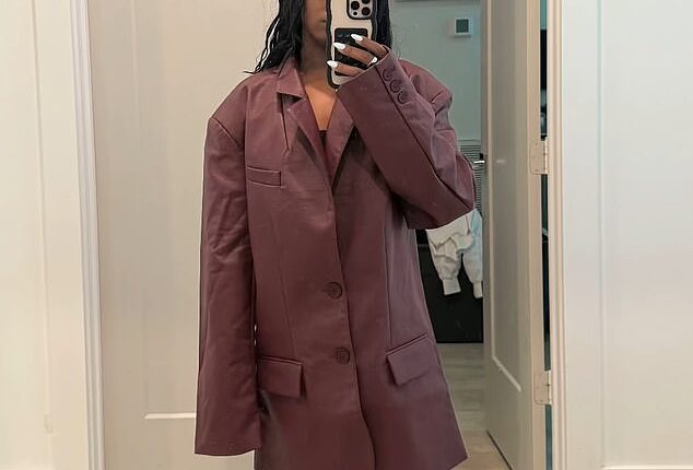 The 28-year-old gymnast snapped a picture of herself trying on a blazer from Kylie Jenner's clothing range, sharing her hilarious response to how ill-fitting it was