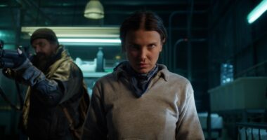 STRANGER THINGS. (L to R) David Harbour as Jim Hopper and Millie Bobby Brown as Eleven in STRANGER THINGS.