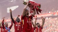 Robertson celebrates winning the Premier League for the second time with Liverpool