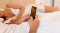 An expert has revealed five warning signs that might indicate your partner is spying on you through your phone (stock image)
