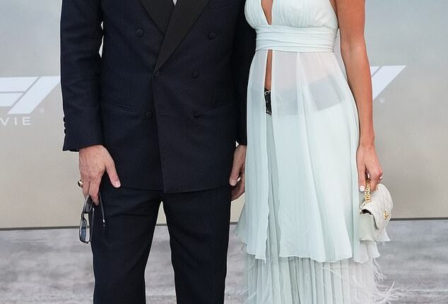 On Monday, Brad Pitt , 61, and his girlfriend, jewelry executive Ines de Ramon , 32, made a rare appearance on the red carpet as they attended the F1 film premiere in New York City - and a body language expert is weighing on why the actor may actually be 'floundering' in his relationship