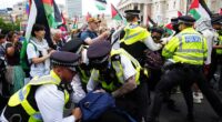 Ugly scenes break out as protesters and police clash in Trafalgar Square this afternoon