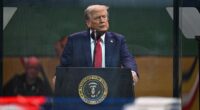 United States President Donald J. Trump reviews the scene during a parade celebrating the 250th anniversary of the U.S. Army, June 14, 2025, in Washington, DC