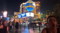In what appears to be video footage of the attack, a man appears to get into a small verbal altercation with a woman in front of the Balloon Sign outside the Paris Las Vegas