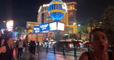In what appears to be video footage of the attack, a man appears to get into a small verbal altercation with a woman in front of the Balloon Sign outside the Paris Las Vegas