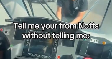 Nottingham Express Transit has issued a warning over a 'dangerous' TikTok trend which sees youngsters surfing on the side of moving trams (pictured: someone taking part in the trend)