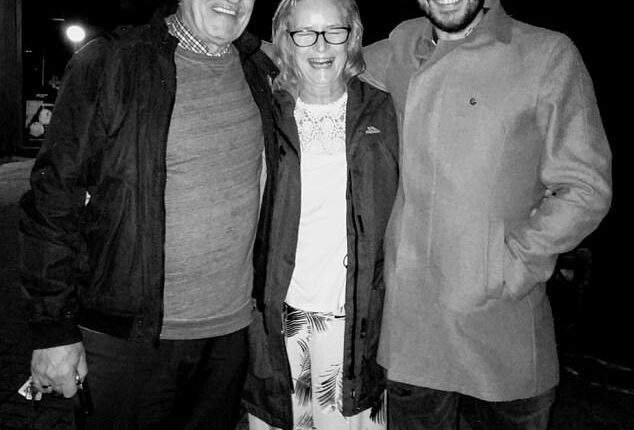 Phil O'Neil-Dwyer (right) was shocked when his mother Joyce (centre, with her husband on the left) was diagnosed with early onset dementia at the age of 58