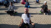 Yoga in a Zimbabwe tavern is the latest mental health outreach in a struggling country