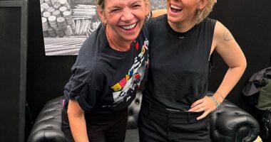 Presenter Zoe Ball (left) made her big BBC Radio 2 return live at Glastonbury this weekend after she was spotted looking 'blissfully happy' with a mystery man (pictured with singer Brandi Carlile)