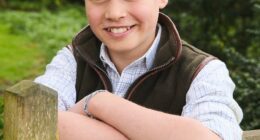 Prince George beams in a photo released to mark his 12th birthday. The young prince was photographed by Josh Shinner in April in Norfolk