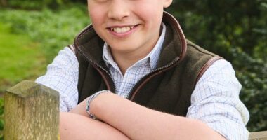 Prince George beams in a photo released to mark his 12th birthday. The young prince was photographed by Josh Shinner in April in Norfolk