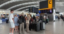 A line of passengers waiting in Heathrow airport yesterday amid airport chaos caused by a NATS technical failure