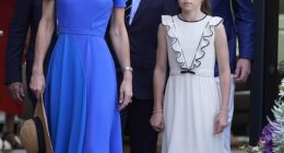 Princess Charlotte donned a bespoke dress that mirrored a style worn by her mother in 2022 and was custom made by the designer behind Kate's wedding dress, Sarah Burton