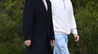 Australian Prime Minister Anthony Albanese and his son Nathan walk towards Parliament House in Canberra