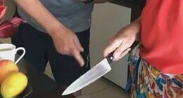 Bree Tomasel captured on camera the amusing moment her Aunty Shirl mistook an Apple MacBook for a chopping board - leaving the family in hysterics