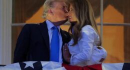 President Donald Trump (left) and first lady Melania Trump (right) smooched on the Truman Balcony ahead of the Washington, D.C. fireworks display marking the Fourth of July Friday