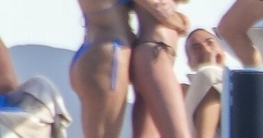 Bikini-clad Dakota Johnson, 35, and BFF Kate Hudson, 46, cuddled up for a friendly embrace as they joined other stars such as Tom Brady on a luxurious yacht in Ibiza