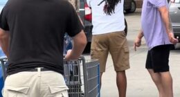 The suspect, a 42-year-old man, is seen being confronted by ordinary shoppers after he rampaged through the Walmart in Michigan