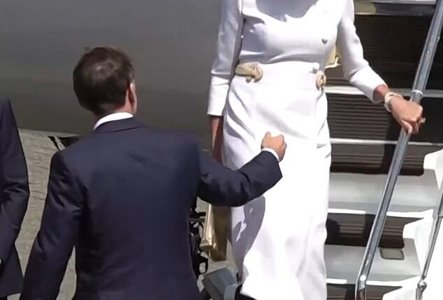 Brigitte and Emmanuel Macron have showed their 'frosty love language' as they landed in the UK today,  body language expert Judi James has claimed
