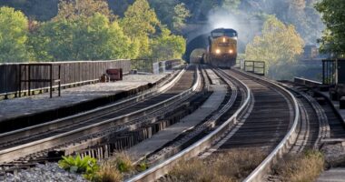 Buy these stocks as railroad-merger talk heats up, analyst says