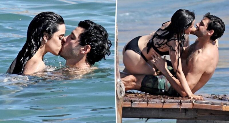 Camila Cabello and billionaire beau Henry Junior Chalhoub get hot and heavy during beach romp in Ibiza