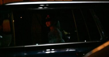 Cassie Ventura, Diddy's popstar ex-girlfriend who testified against him at trial, was seen for the first time - covered by bodyguards - since the shock verdict with umbrellas protecting her as she left New York City