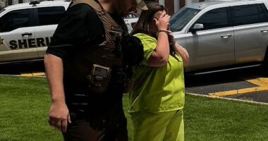 Rebecca Brewer, one of the seven adults charged in connection to alleged horrid child abuse, was seen covering her face with her shackled hands, telling reporter: 'I didn't do this. I love my babies' outside of court Thursday