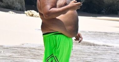 DJ Khaled came close to showing off more of his figure than he intended to when he was seen enjoying a beach day in Barbados