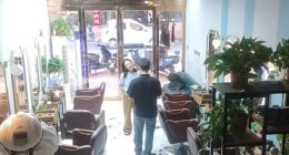 A Chinese woman went to her local salon to get a haircut, but asked to borrow some money from the owner when she realised she'd left her purse at home (Pictured: CCTV of the incident)