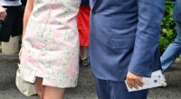 Michael McIntyre cosied up to leggy wife Kitty as they attended day eight of Wimbledon at The All England Lawn Tennis Club on Monday