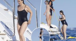 Drew Barrymore takes a dip in black swimsuit on yacht in St. Tropez