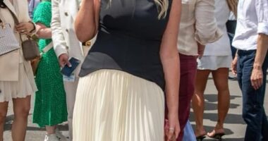 Emily Atack jokes she was 'fully clothed' as she attended Wimbledon - after THAT naked tennis scene in racy series Rivals