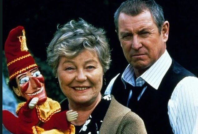 A publicity shot for the Midsomer Murders episode Destroying Angel. Rosemary Leach who played Evelyn Pope is pictured with John Nettles who played DCI Tom Barnaby. Evelyn Pope used destroying angel mushrooms in a horrific revenge killing.