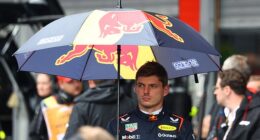Max Verstappen looked unimpressed as he waited under a Red Bull umbrella in the pit lane, having slammed the red flag decision as ‘silly’ over team radio