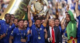 US President Donald Trump inserted himself into the heart of Chelsea's trophy lift on Sunday