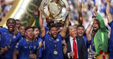 US President Donald Trump inserted himself into the heart of Chelsea's trophy lift on Sunday