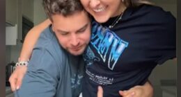 JoJo Siwa and Chris Hughes sparked pregnancy rumors with this viral on TikTok this month. He was seen  gently rubbing her stomach for a couple seconds