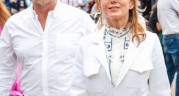 Christian Horner is pictured with his wife, former Spice Girl Geri Horner, at Goodwood Festival in July last year