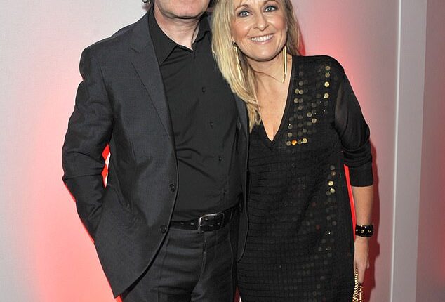 Fiona Phillips has not cooked in years and has no time for her dressing room of designer clothes as she battles Alzheimer's , her husband Martin Frizell has revealed. Pictured: The couple in 2010