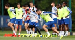 A former Chelsea manager was rushed to hospital after falling ill during a training session