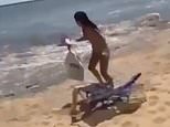 Frightening moment beachgoers scream as 'mini-tsunami' hits south of Spain leaving eight injured