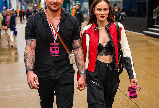 Holly Ramsay commanded attention in a black lace top as she arrived at Silverstone for the British Grand Prix with partner Adam Peaty on Sunday