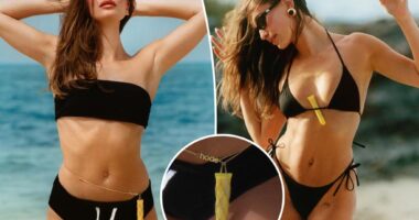 Hailey Bieber styles her bikini with a custom Rhode belly chain